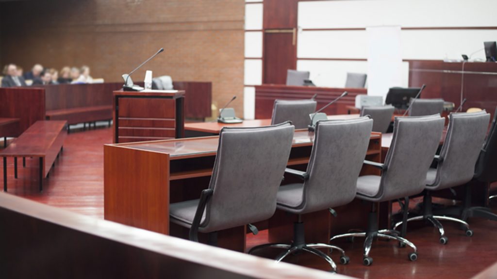 Defendants' table in courtroom