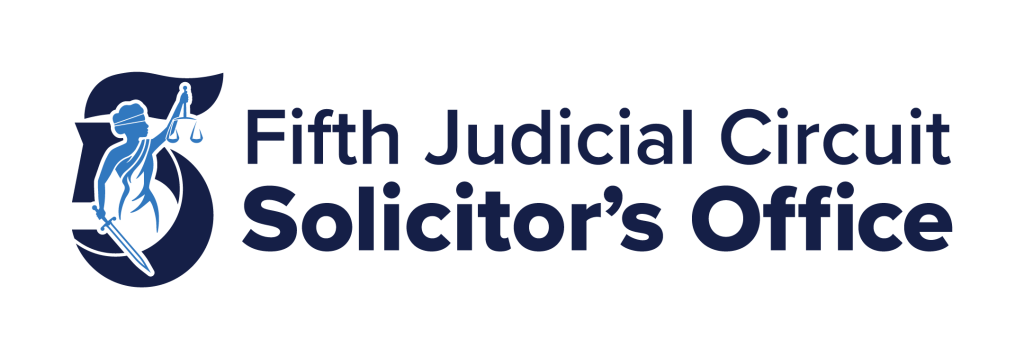 The logomark for the Fifth Judicial Circuit Solicitor's Office features a navy-blue numeral 5, overlaid with a coastal-blue image of Lady Justice. To the right of the logomark, the wordmark "Fifth Judicial Circuit" is displayed in navy blue, with "Solicitor's Office" in a bolder font stacked underneath it.